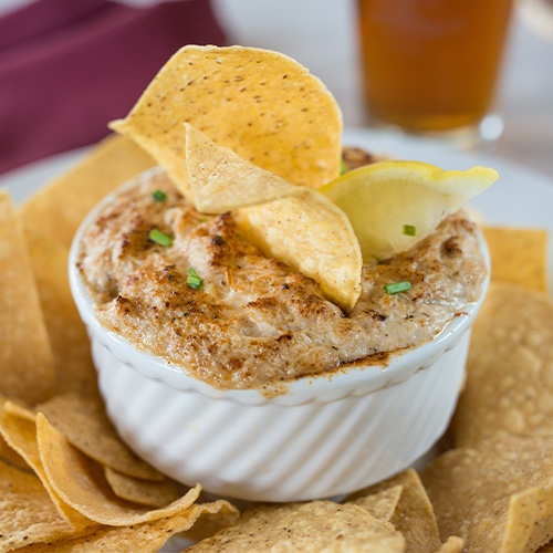 chips and dip being served on the terrace at Brookside Country Club