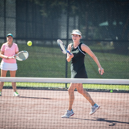 women playing tennis at Brookside Country Club